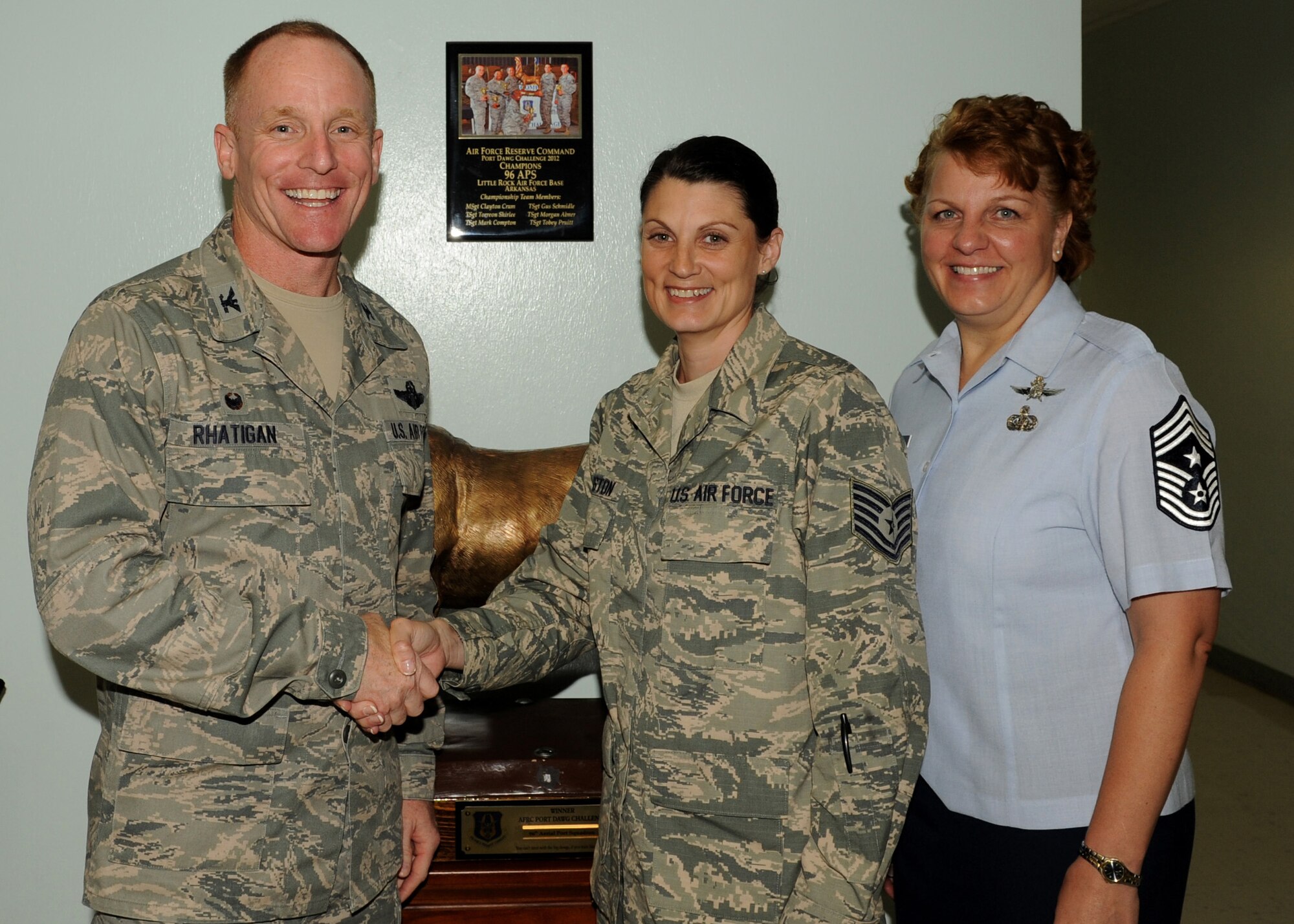 Tech. Sgt. Jacqueline Langston, a 96 Aerial Port Squadron unit training, education and deployment manager, pulls deployment folders for processing Aug. 11, 2014, at Little Rock Air Force Base. Langston, a Decatur, Ala., native, was recognized as the Combat Airlifter of the Week for playing a vital role in coordinating all required training and educational requirements as the unit training manager for 130 personnel. (U.S. Air Force photo by Airman 1st Class Scott Poe)
