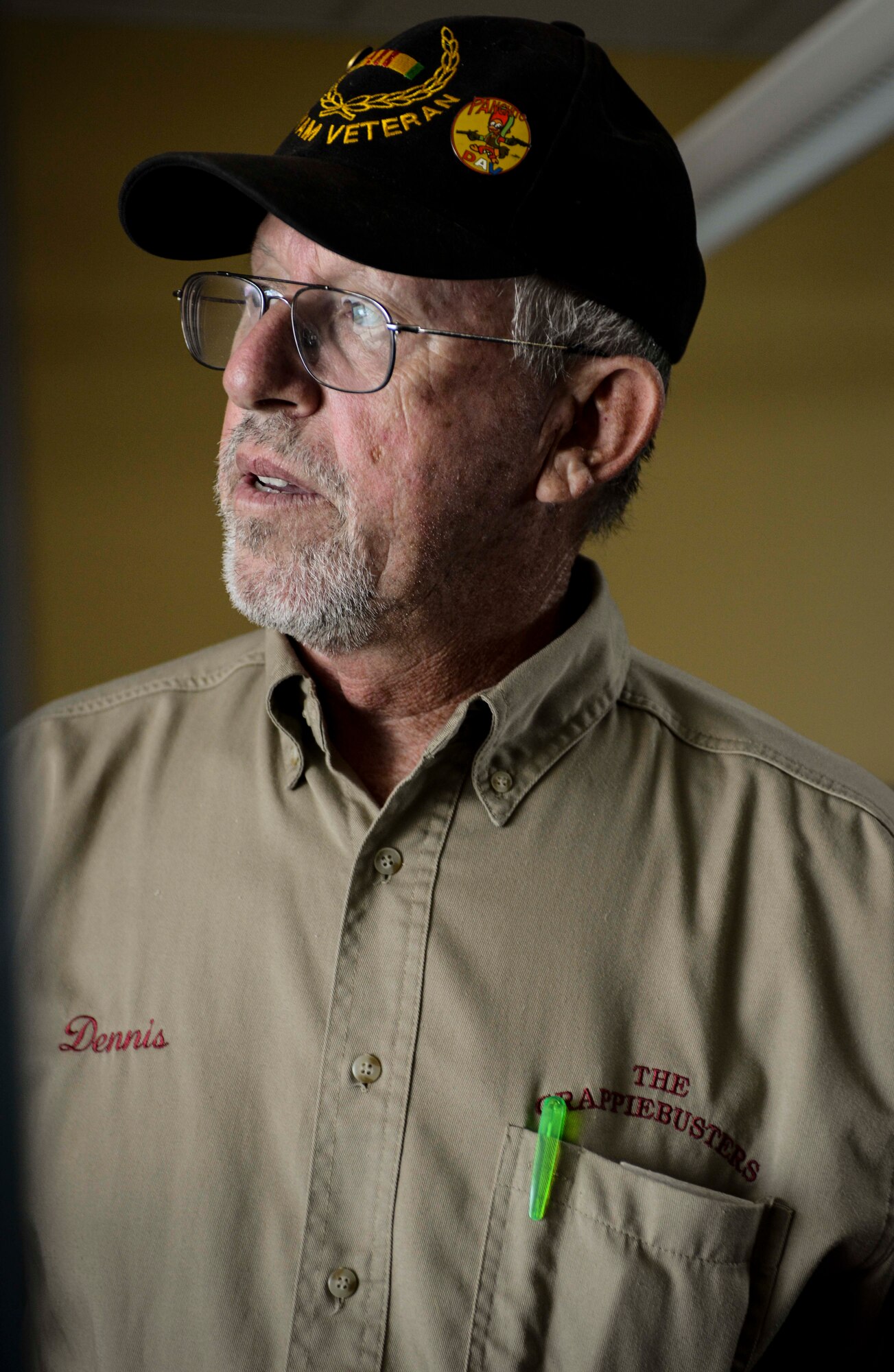 Retired Senior Master Sgt. Dennis Miller listens to a description of weather equipment given by a member of the 5th Operations Squadron weather flight on Minot Air Force Base, N.D., Aug. 8, 2014. Miller worked on a variety of high profile projects during his 22-year career, including a radar site in Nakhon Phanom, Thailand, used to monitor cloud cover over Hanoi during the Vietnam War. (U.S. Air Force photo/Senior Airman Stephanie Morris.)