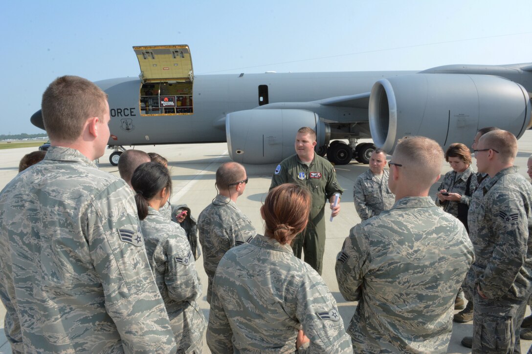 Airmen from across the state of Wisconsin receive a briefing from the boom operator prior to their KC-135 Stratotanker flight at the 128th Refueling Wing, Wis., July 31, 2014. The Airmen were selected to participate in the three-day Junior Enlisted Opportunity Program headed up by the state’s first sergeants. They spent three days touring the 115th Fighter Wing, Volk Field and the 128 ARW to gain a better understanding of each bases’ mission. (Air National Guard photo by Senior Airman Andrea F. Liechti)