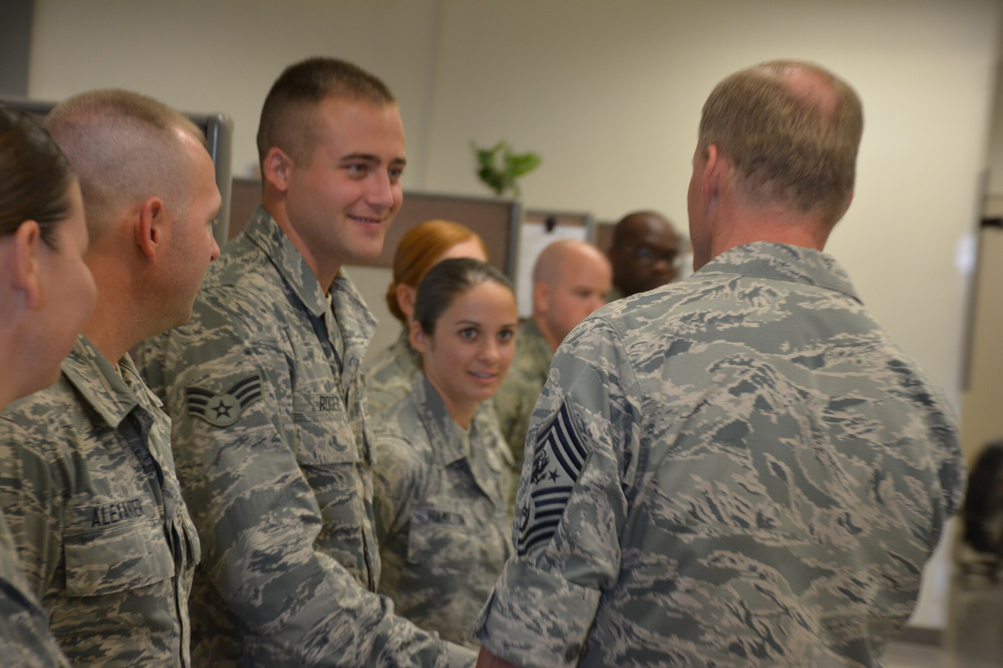 Chief Master Sgt. of the Air Force James A. Cody greets Senior Airman Chase Rogers, 507th Maintenance Squadron and other members of the 507th Air Refueling Wing during the August Unit Training Assembly. (U.S. Air Force Photo/Maj. Jon Quinlan)