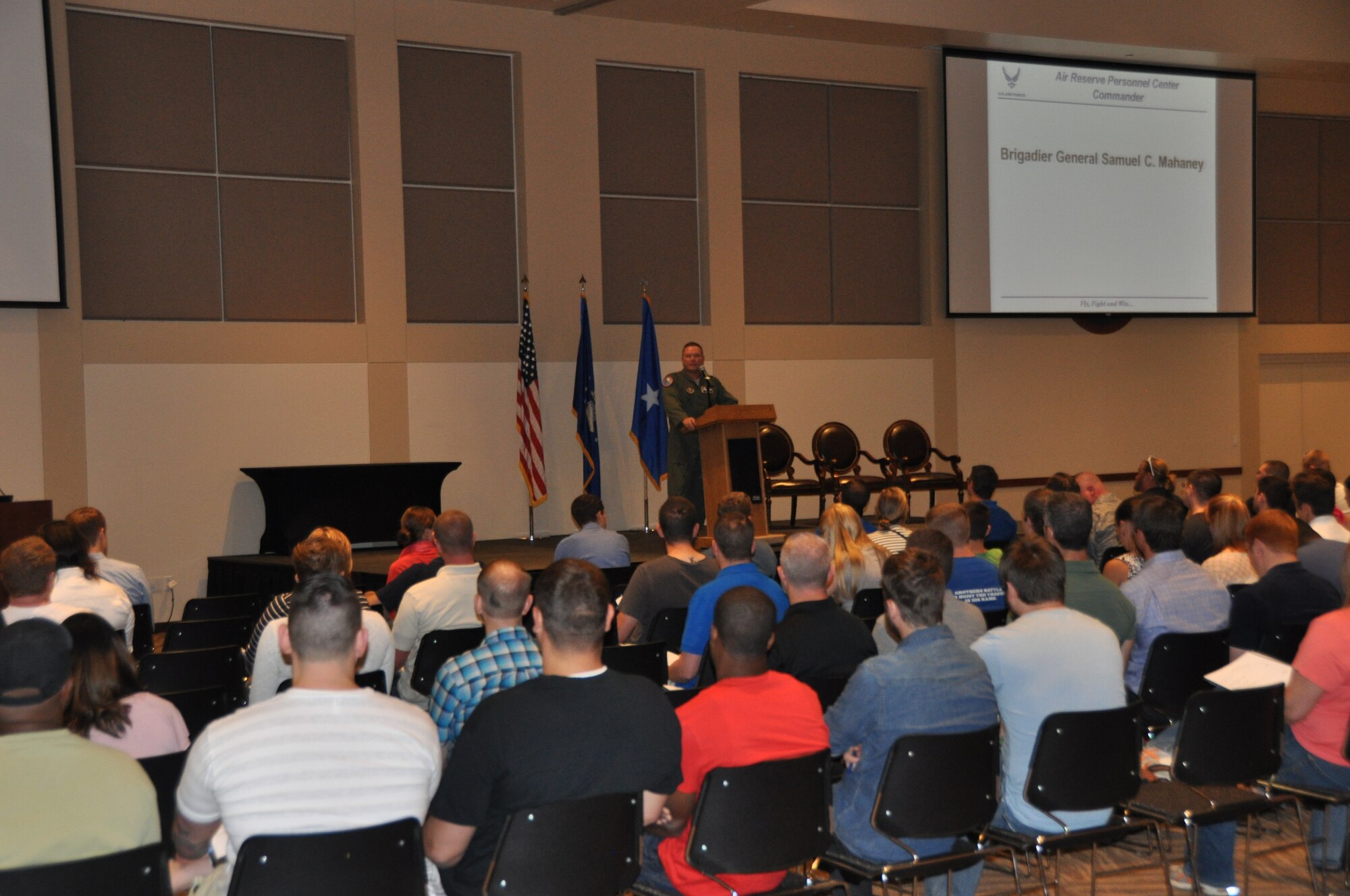 Brig. Gen. Samuel “Bo” Mahaney, Air Reserve Personnel Center commander, welcomes and briefs more than 150 Airmen who attended an Air Force Individual Ready Reserve muster screening Aug. 7, 2014, at Buckley Air Force Base, Colo. (U.S. Air Force photo/ Tech. Sgt. Rob Hazelett)