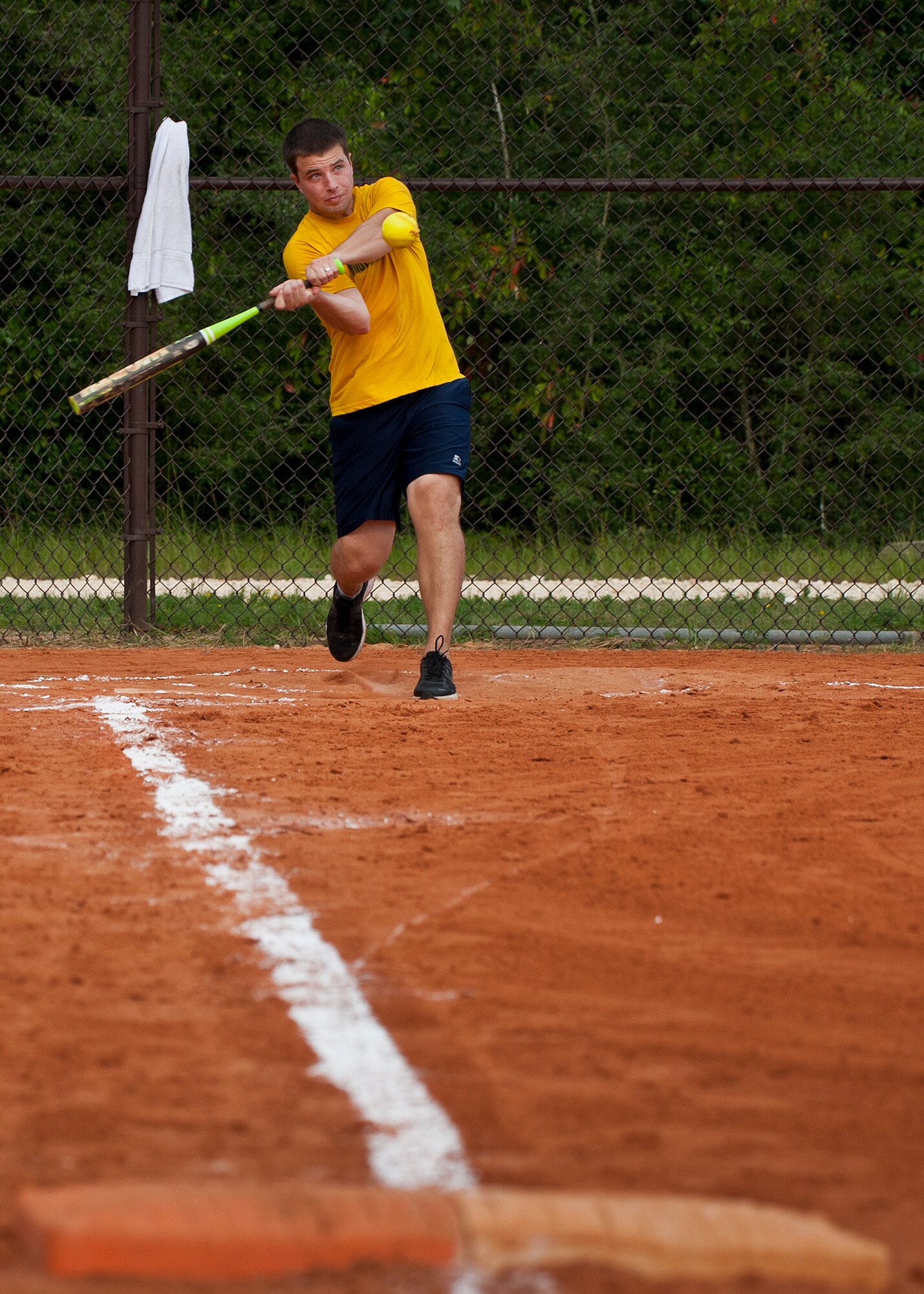 A 780th Test Squadron player swings for the fences during an intramural softball game against the 96th Medical Group at Eglin Air Force Base, Fla., Aug. 12.  MDG defeated the 780th, 22-3.  (U.S. Air Force photo/Tech. Sgt. Cheryl Foster)