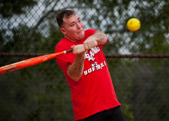 The 96th Medical Group’s Dillon Nails swings for the fences during his team’s rout of the 780th Test Squadron during an intramural softball game at Eglin Air Force Base, Fla., Aug. 12.  MDG defeated the 780th, 22-3.  (U.S. Air Force photo/Tech. Sgt. Cheryl Foster)