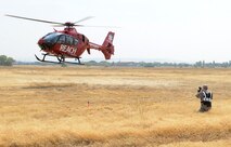 A local air medical services helicopter prepares to land during an emergency services exercise at Beale Air Force Base, Calif., Aug. 8, 2014. The exercise featured more than 20 base and local agencies. (U.S. Air Force photo by John Schwab/Released)