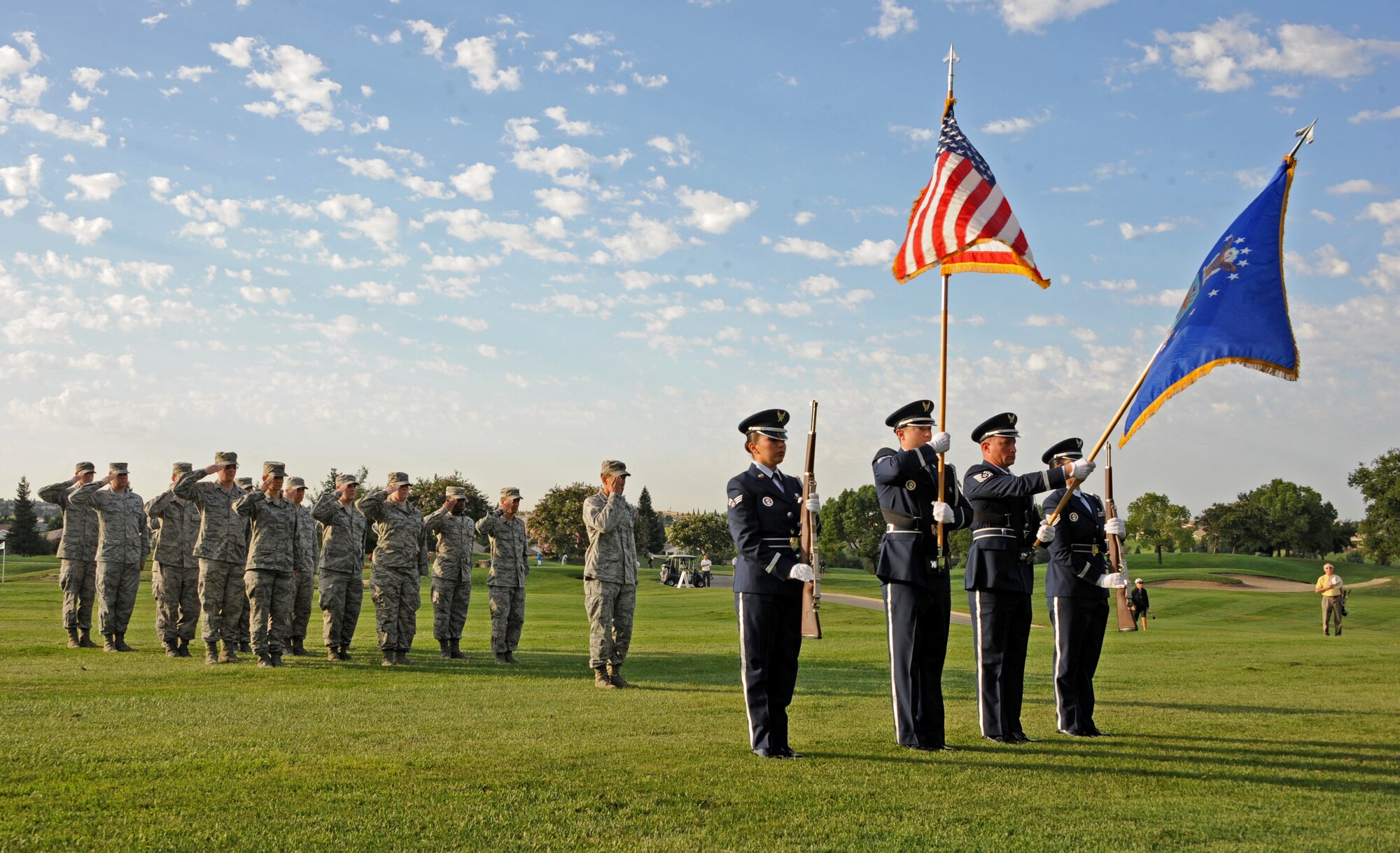 The 940th Wing Honor Guard presents the colors during the World's Largest Golf Outing, benefiting the Wounded Warrior Project, Aug. 11, 2014, at Lincoln Hills Golf Club in Lincoln, Calif. The World's Largest Golf Outing is an annual event spanning 26 states at more than 120 courses simultaneously. (U.S. Air Force photo by Airman 1st Class Ramon A. Adelan/Released)