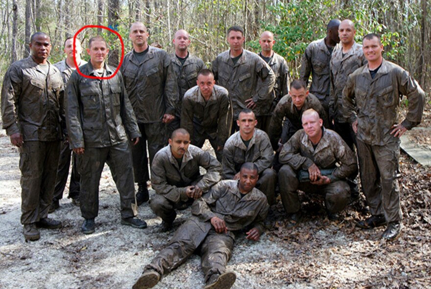 U.S. Air Force Office of Special Investigations Special Agent James F. Hoy, circled, poses with his squad after a session on the obstacle course. Courtesy photo 

