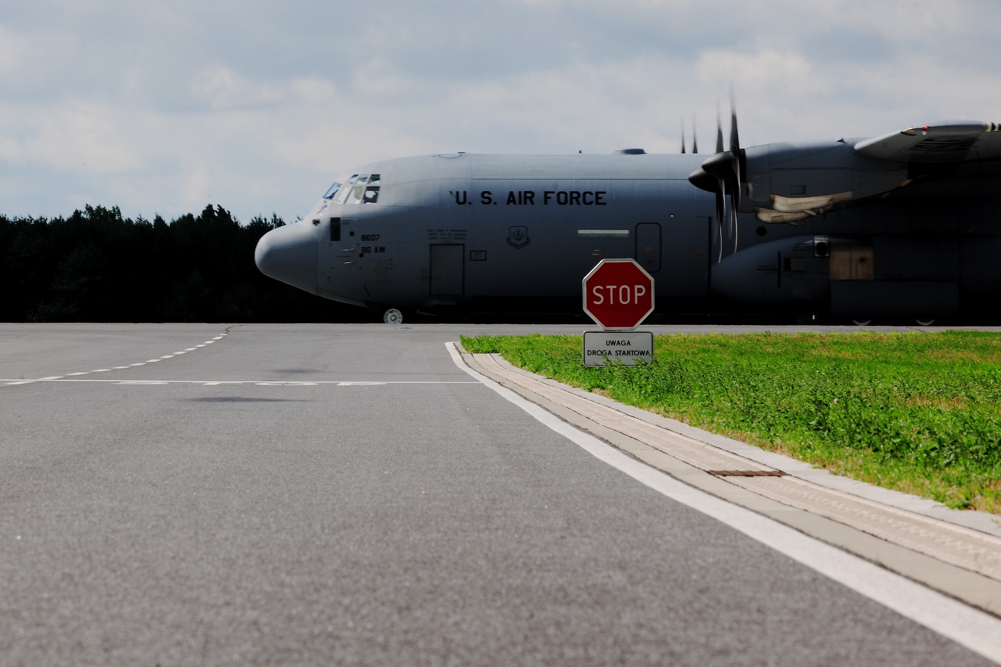 A C-130J Super Hercules taxis down the runway at Powidz Air Base, Poland, Aug. 14, 2014. Deployed from Ramstein Air Base, Germany, the Airmen and aircraft will be working side-by-side with NATO allies and European partners and conducting combined training exercises in support of Operation Atlantic Resolve. (U.S. Air Force photo by Staff Sgt. Jarad A. Denton/Released)