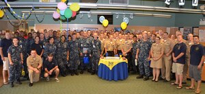 It was an evening of celebration, trying on uniforms, food and camaraderie as newly selected chief petty officers from all the LowCountry commands came out to the Navy Exchange’s special evening for the chief petty officer selectees Aug. 13, 2014, at Joint Base Charleston, S.C.  As Sailors make the transition to the rank of chief petty officer (E-7), new uniforms are required and experienced chiefs serve as sponsors to the selectees, helping them pick out all the correct uniform items they will need as they begin the next step of their careers. (U.S. Air Force photo/ Eric Sesit)