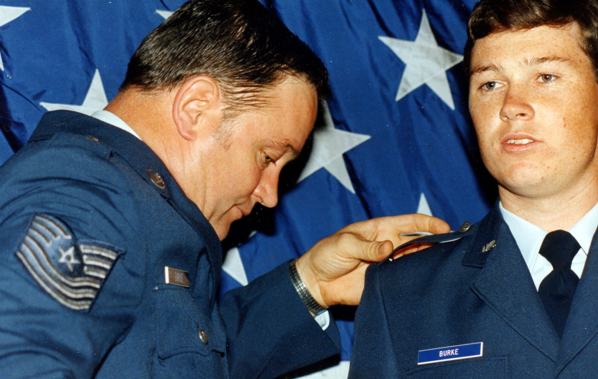 Then-2nd Lt. Darryl Burke is commissioned by his father, Master Sgt. Billy Ray Burke, in 1983.  Burke was commissioned as a distinguished graduate of the Reserve Officer Training Corps program from Embry-Riddle Aeronautical University, Daytona Beach, Fla. Burke, now a Major General, says his lifelong experience in the Air Force has shaped his command philosophy in his new role as Air Force District of Washington commander. (Courtesy photo)