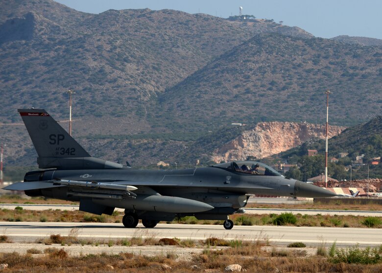 A U.S. Air Force F-16 Fighting Falcon fighter aircraft pilot from the 480th Fighter Squadron taxis to the end of the flightline prior to his launch at Souda Bay, Greece, during a training event Aug. 12, 2014. The U.S. pilots worked with the Hellenic air force in air to complete various training objectives. (U.S. Air Force photo by Staff Sgt. Daryl Knee/Released)