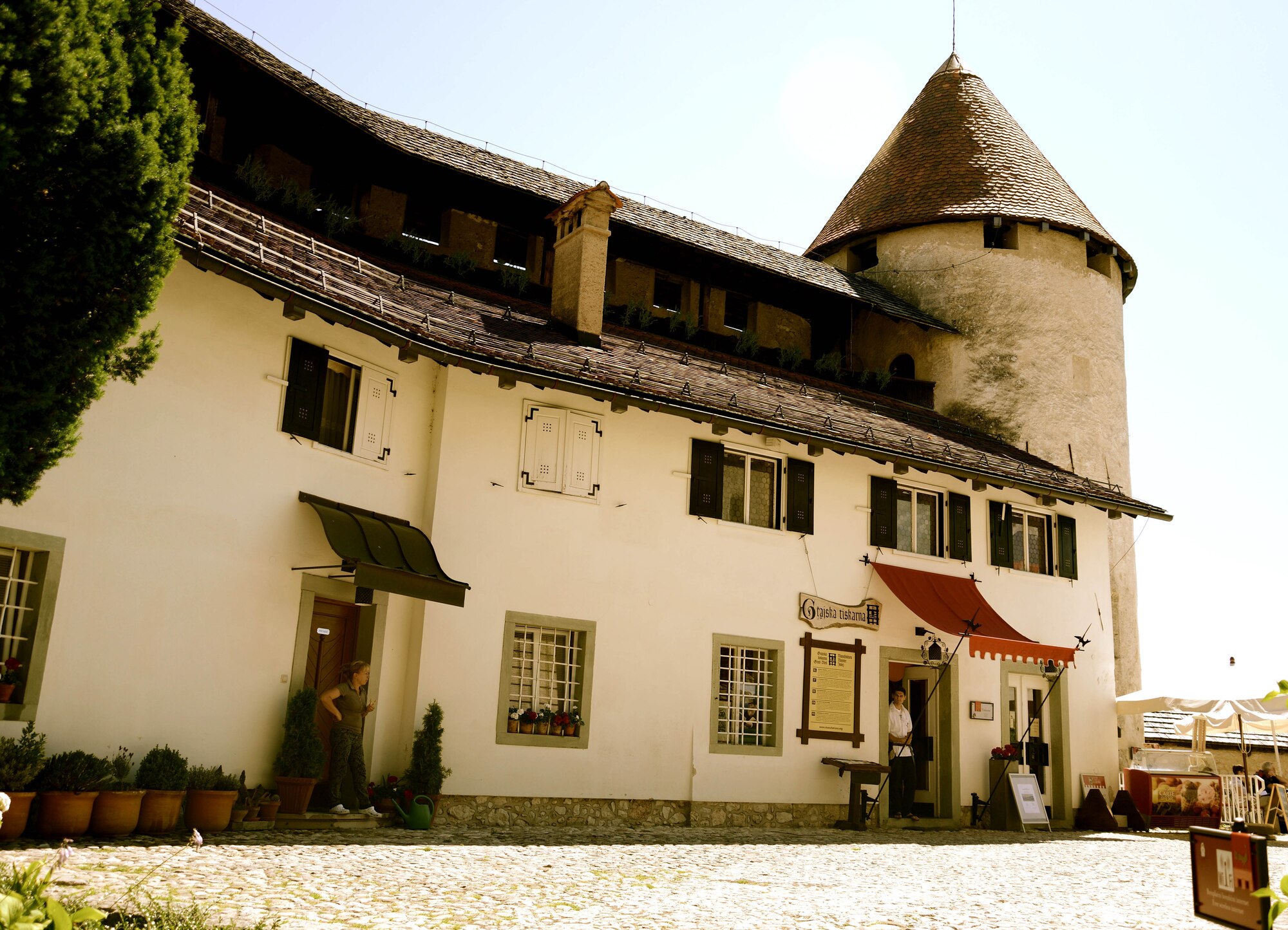 The once Romanesque tower in 1004 A.D. is now a museum that sits on top of a hill at Lake Bled, Slovenia. The museum holds a collection of armor and weapons from the 16th and 18th centuries, and hosts a view of the lake, in which many tourists go to photograph. (U.S. Air Force illustration/Capt. Lacie Collins)