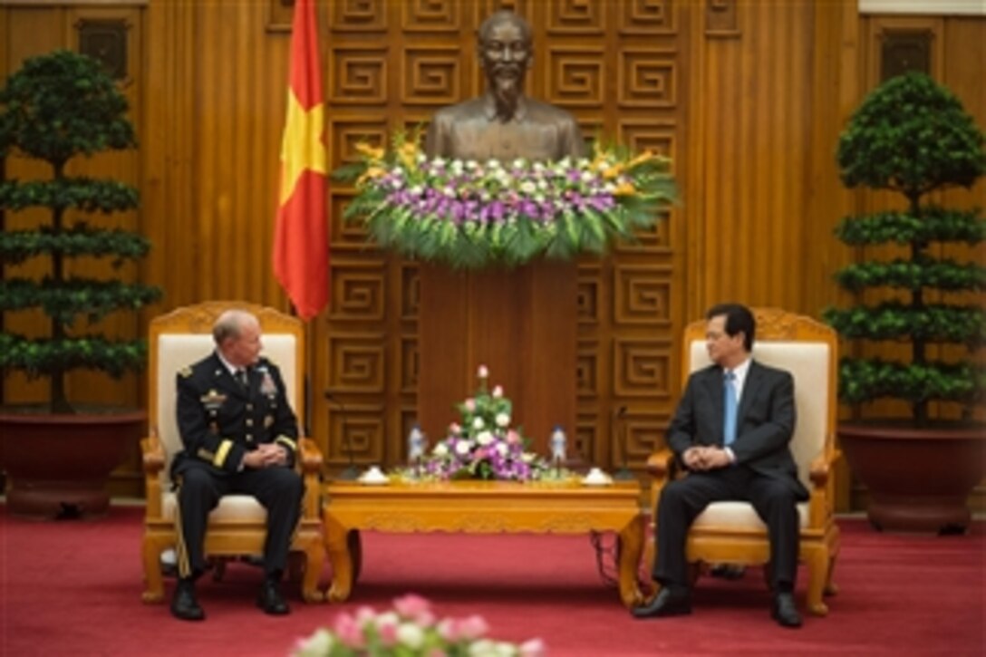 U.S. Army Gen. Martin E. Dempsey, chairman of the Joint Chiefs of Staff, and Vietnamese Prime Minister Nguyen Tan Dung meet in Hanoi, Vietnam, Aug. 14, 2014.