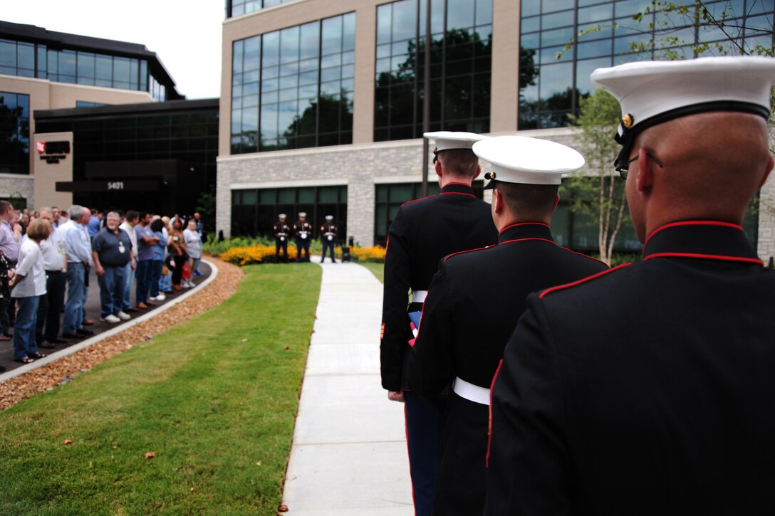 Marines from Recruiting Station Nashville and Reserve Station Smynra conducted a flag raising ceremony at the Tractor Supply Company in Brentwood, Tenn. Aug. 8 to show their support for the community and honor its grand opening. (Official Marine Corps photo by Sgt. Michael Iams)