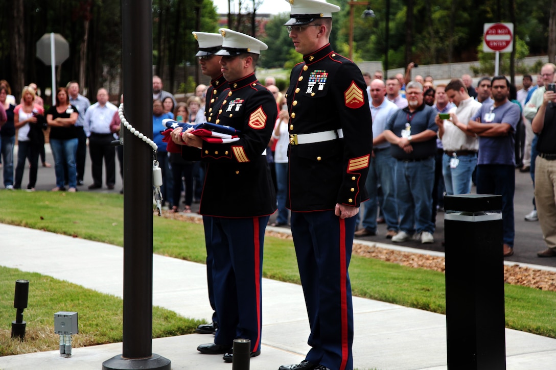 Marines from Recruiting Station Nashville and Reserve Station Smynra conducted a flag raising ceremony at the Tractor Supply Company in Brentwood, Tenn. Aug. 8 to show their support for the community and honor its grand opening. (Official Marine Corps photo by Sgt. Michael Iams)