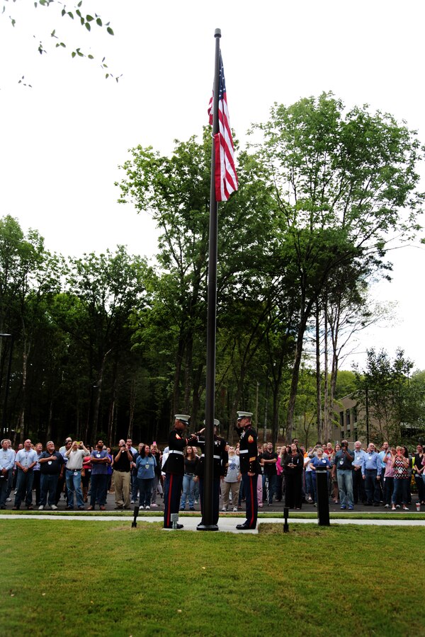 Marines from Recruiting Station Nashville and Reserve Station Smynra conducted a flag raising ceremony at the Tractor Supply Company in Brentwood, Tenn. Aug. 8 to show their support for the community and honor its grand opening. (Official Marine Corps photo by Sgt. Michael Iams)