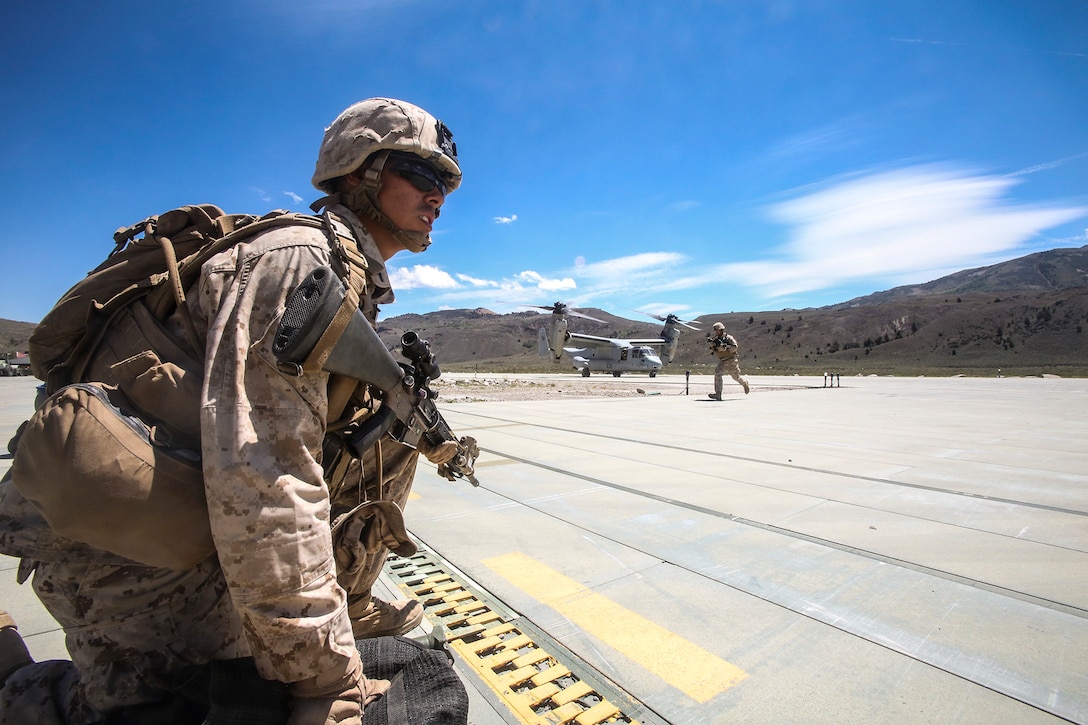 A Marine with Company F, 2nd Battalion, 7th Marine Regiment, provides security during a tactical non-combatant evacuation training mission at the Mountain Warfare Training Center in Bridgeport, Calif., Aug. 13, 2014. The Marines of 2nd Bn., 7th Marines, conducted the evacuation drill as part of Large Scale Exercise 2014. LSE-14 is a bilateral training exercise being conducted by 1st Marine Expeditionary Brigade to build U.S. and Canadian forces’ joint capabilities through live, simulated, and constructive military training activities from Aug. 8-14 aboard Marine Corps Air Ground Combat Center in Twentynine Palms, Calif.