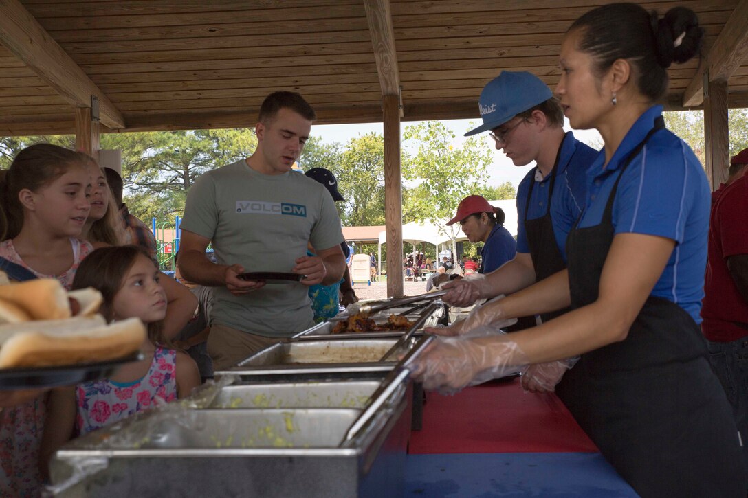 NORFOLK, Va. (Aug. 15, 2014) – Marines, Sailors, civilian Marines and their families attended the 2014 Hampton Roads Marine Corps Ooh Rah Day Summer Bash at Capt. Slade Cutter Athletic Park Aug. 15. During the bash, Marine Corps Community Services treated service members and their families to various entertaining activities such as bouncy houses, a rock wall, petting zoo, raffles and barbeque.