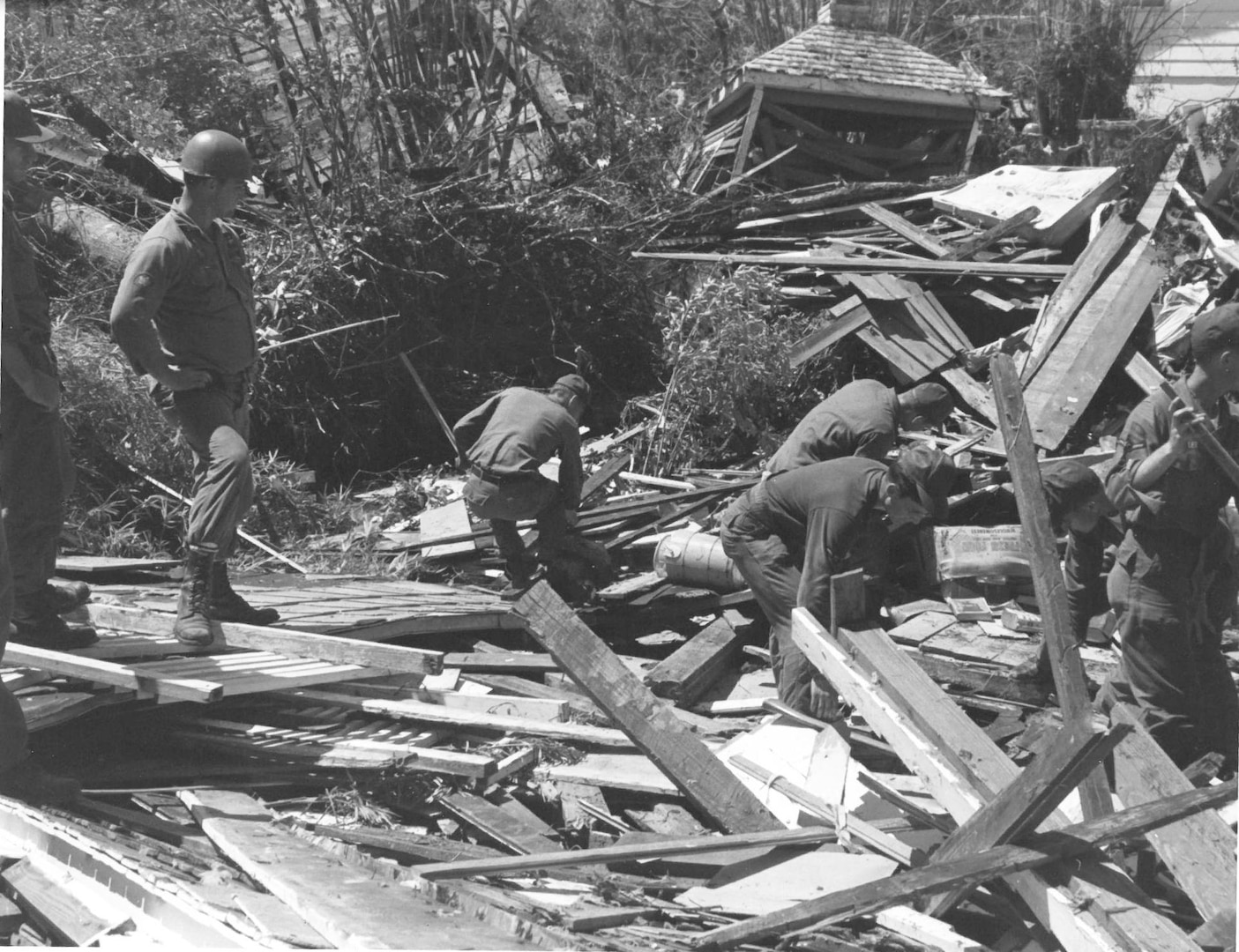 Mississippi Army National Guard helps in cleanup operations in aftermath of Hurricane Camille in Gulfport-Biloxi area.