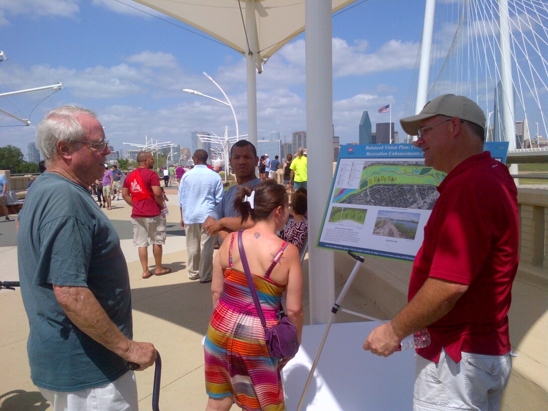 Fort Worth District joined in the celebrations of opening day of the Continental Avenue Bridge linear park in downtown Dallas with an information booth. Trinity River Project Director Rob Newman explains details if ecosystem restoration and flood risk reduction improvements proposed for the Dallas Floodway in this area.
