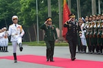 HANOI, Vietnam (Aug. 14, 2014) - U.S. Army Gen. Martin E. Dempsey, chairman of the Joint Chiefs of Staff, participates in a Vietnamese honor guard ceremony at the Ministry of Defense in Hanoi.  (DoD photo by D. Myles Cullen) 140814-D-VO565-005

