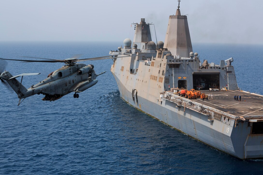 U.S. 5TH FLEET AREA OF RESPONSIBILITY - A U.S. Marine Corps CH-53E Super Stallion helicopter with Marine Medium Tiltrotor Squadron 263, 22nd Marine Expeditionary Unit, prepares to land aboard the amphibious transport dock ship USS the Mesa Verde. The 22nd MEU is deployed with the Bataan Amphibious Ready Group as a theater reserve and crisis response force throughout U.S. Central Command and the U.S. 5th Fleet area of responsibility. (U.S. Marine Corps photo by Cpl. Manuel A. Estrada/Released)
