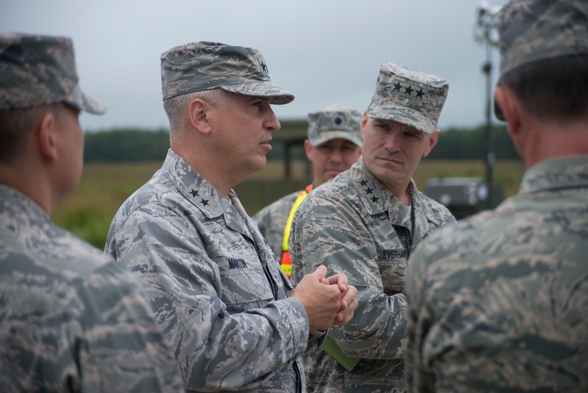 Maj. Gen. Rick Martin, U.S. Air Force Expeditionary Center commander, explains a training scenario during this iteration of Exercise Eagle Flag, to Lt. Gen. Carlton D. Everhart II, 18th Air Force commander Aug. 13 at Joint Base McGuire-Dix-Lakehurst. The Expeditionary Center directs exercise Eagle Flag, the Air Force’s only flag-level tests contingency response units’ ability to quickly establish aerial operations, provide security, track cargo and personnel, and move supplies. Everhart was at JB MDL for an orientation of the Expeditionary Center.  (US Air Force Photo/Master Sgt. Christopher Bergstrom)
