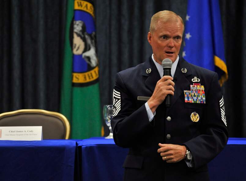 Chief Master Sgt. of the Air Force James Cody gives opening remarks during a Congressional Military Family Caucus at Fairchild Air Force Base, Washington, Aug. 14, 2014. The Caucus was held to give military families the opportunity to discuss various issues with a panel including congressional representatives, Cody and his wife, Athena, and various support organizations from around the base. (U.S. Air Force photo by Senior Airman Mary O'Dell/Released)