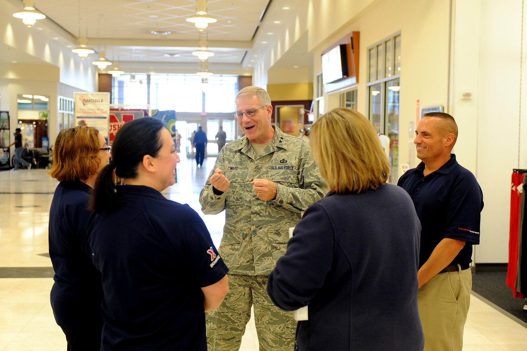 U.S. Air Force Maj. Gen. Joseph S. Ward, Army and Air Force Exchange Services deputy director, is greeted by Base Exchange management and staff as part of a tour at Offutt Air Force Base, Nebraska, Aug. 14. Ward met with staff members throughout the BX during his visit.  (U.S. Air Force photo by Josh Plueger/Released)