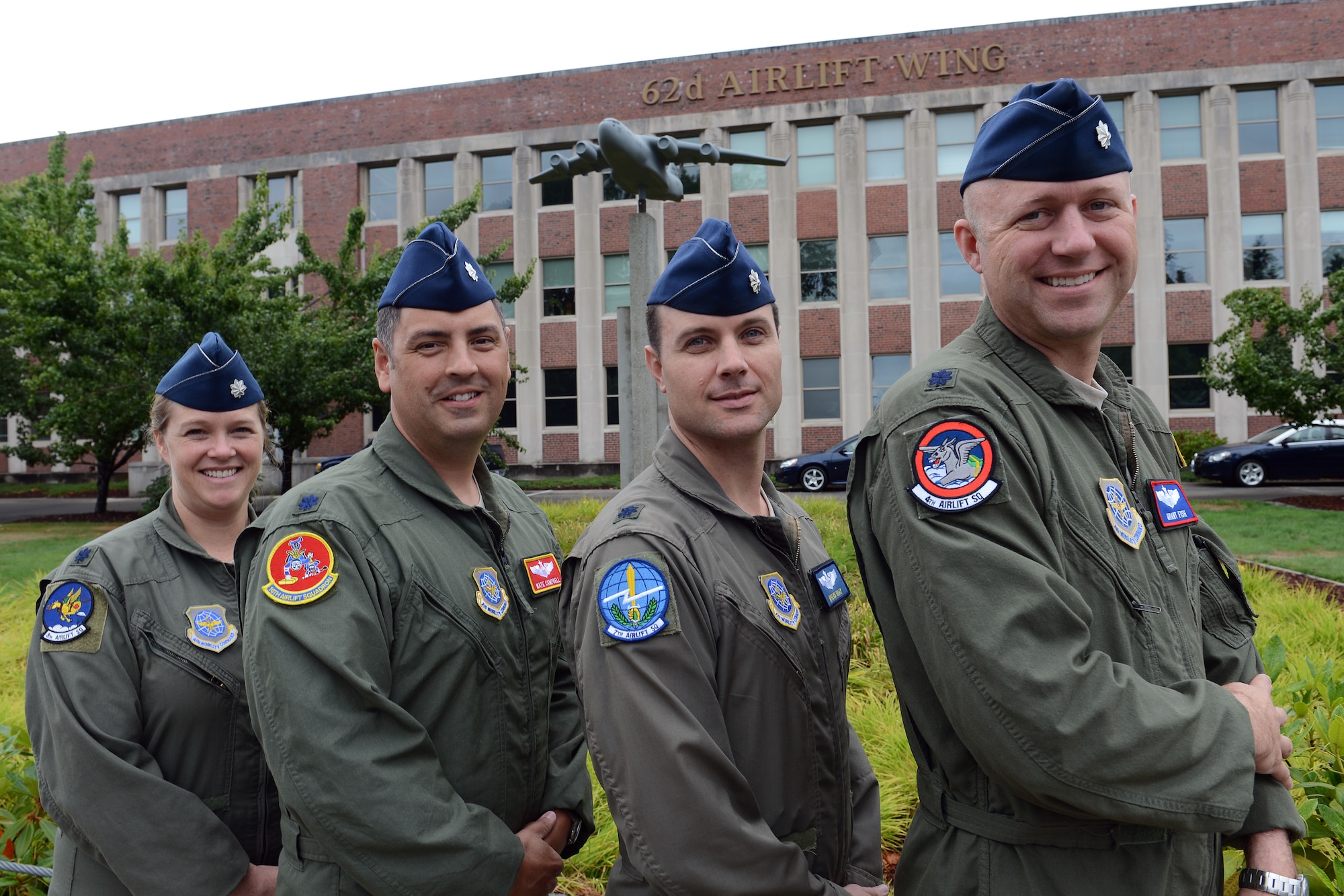 Leadership from the 62nd Airlift Wing’s flying squadrons display their squadron colors Aug. 13, 2014, at Joint Base Lewis-McChord, Wash. As part of a new deployment rotation schedule, the airlift squadrons will rotate deployments with Joint Base Charleston, S.C. every 75 days.(U.S. Air Force photo/Airman 1st Class Jacob Jimenez) 