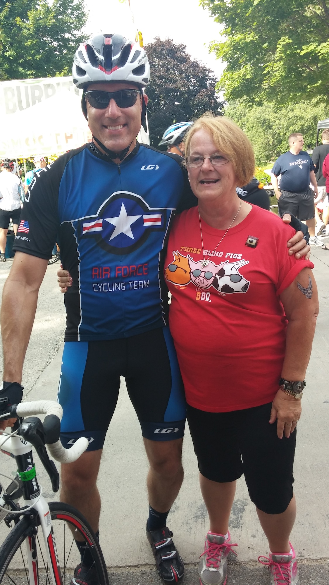 Karen Willett, Air Reserve Personnel Center executive secretary to the commander, and Maj. Trent Champion, ARPC technical advisor, pose for a photo during the Register's Annual Great Bicycle Ride Across Iowa July 24, 2014. The members from ARPC recently took to the heartland and made their presences known via their volunteering and riding efforts during the Register's Annual Great Bike Ride Across Iowa bicycling event held July 20-26. (U.S. Air Force courtesy photo)