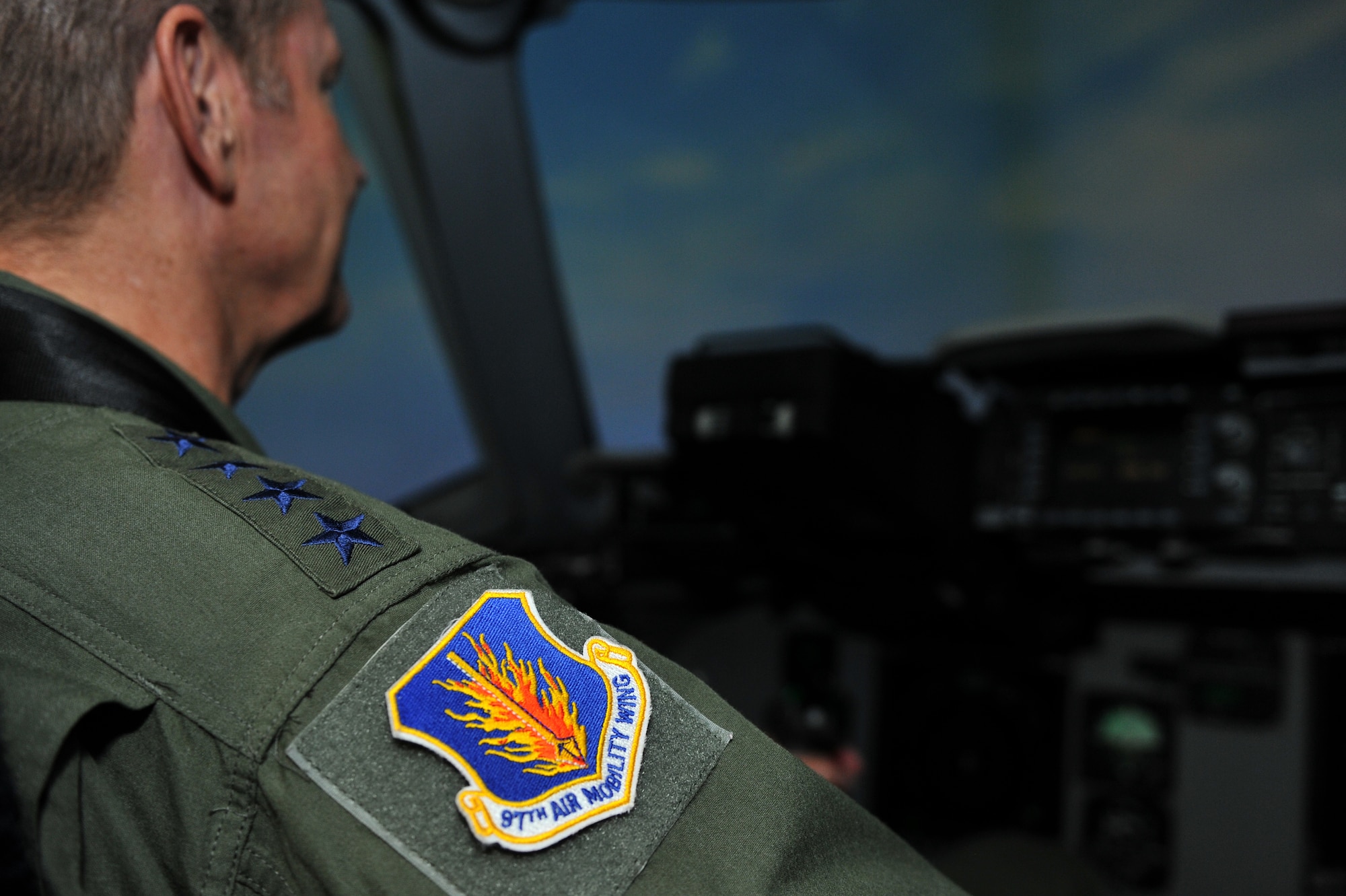 ALTUS AIR FORCE BASE, Okla. – U.S. Air Force Gen. Robin Rand, commander of Air Education and Training Command, wore the 97th Air Mobility Wing patch on his flight suit while visiting the 58th Airlift Squadron C-17 Globemaster III simulators Aug. 7, 2014. In the simulator, Rand was able to simulate in-flight refueling and assault landings to get a feel for what the 97th Air Mobility Wing training mission consists of. (U.S. Air Force photo by Senior Airman Dillon Davis/Released)