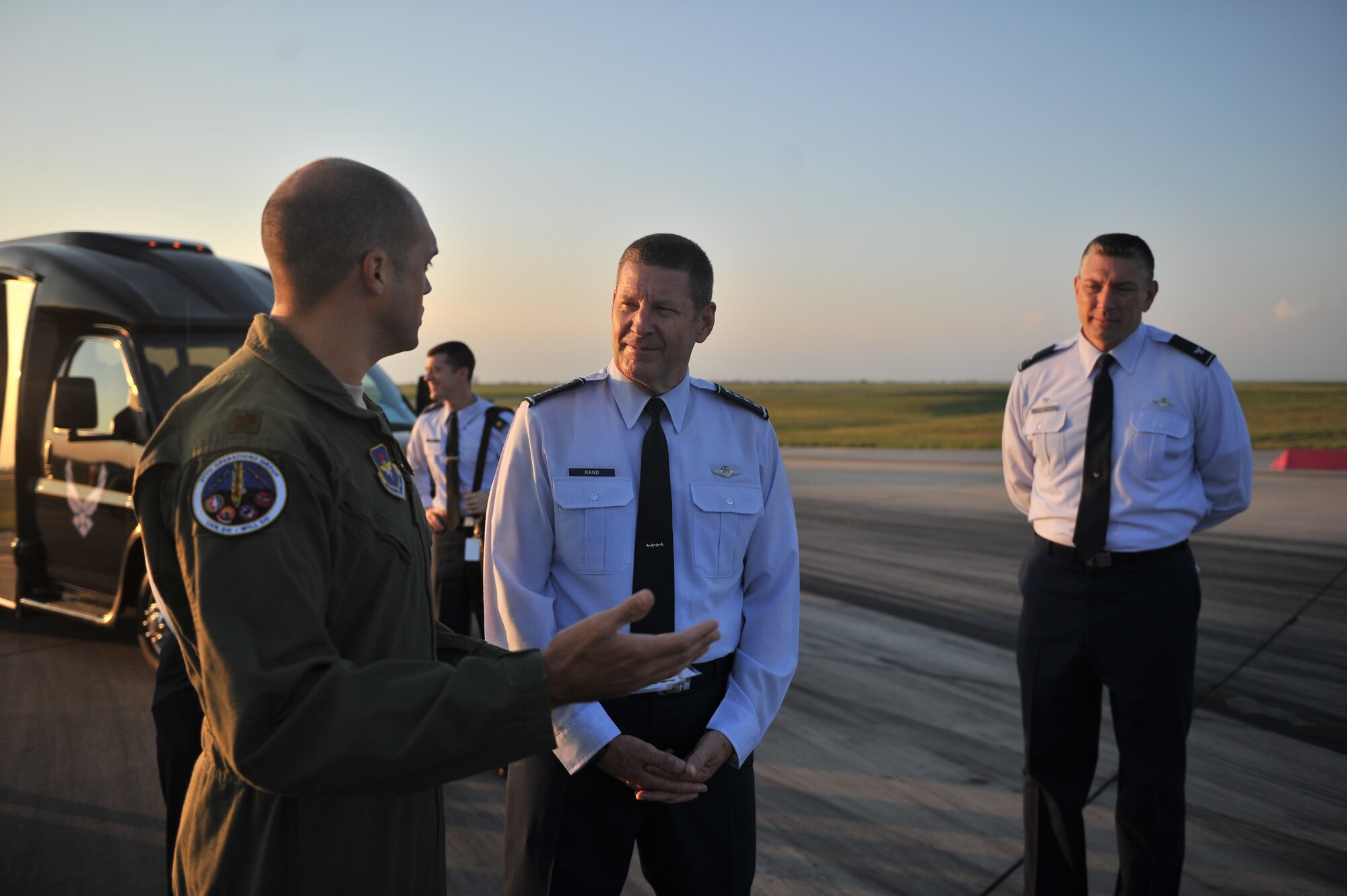 ALTUS AIR FORCE BASE, Okla. – U.S. Air Force Maj. Matt Valero, 97th Operations Group, briefs U.S. Air Force Gen. Robin Rand, commander of Air Education and Training Command, about how the in-house rubber removal process has saved the base money Aug. 7, 2014. The in-house rubber removal process is accomplished by the 97th Civil Engineer Squadron instead of paying an outside contractor to do the same job which allows the base to use the money saved for other mission essential operations. (U.S. Air Force photo by Senior Airman Dillon Davis/Released)