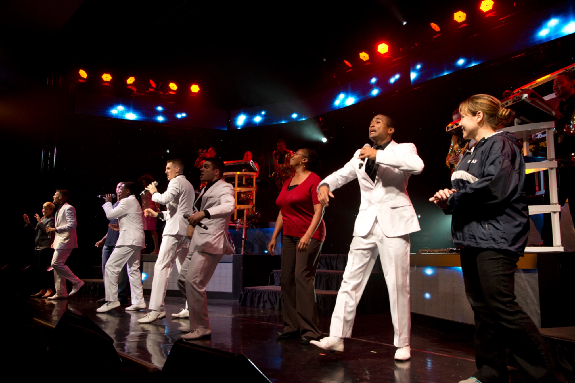 JOINT BASE ELMENDORF-RICHARDSON, Alaska -- Members of Tops In Blue, the Air Force’s premier entertainment showcase, get some help from audience members during a performance of “Sweet Home Alabama” for a packed house at the Talkeetna Theater here Aug. 11. Tops In Blue, is an all-active duty US Air Force special unit made up of talented amateur performers selected for their entertainment abilities. Tops In Blue is one of the oldest and most widely traveled entertainment groups of its kind. Composed of 35 to 40 talented vocalists, musicians, dancers, and technicians, their primary purpose is to perform for military personnel and their families throughout the world. (U.S. Air Force photo/Staff Sgt. Wes Wright)