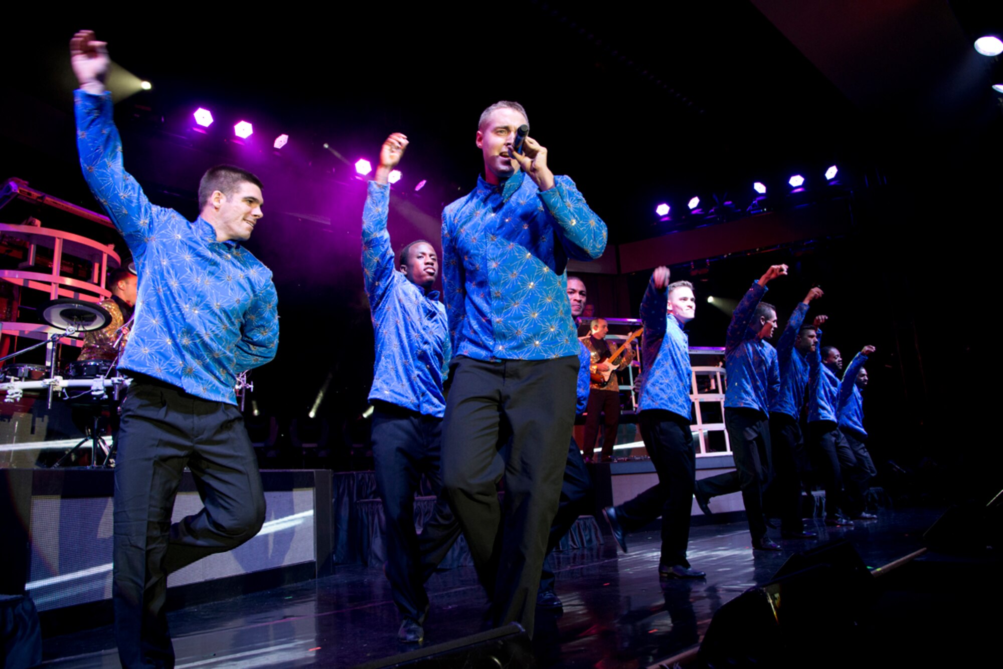 JOINT BASE ELMENDORF-RICHARDSON, Alaska – Airman 1st Class Alexander Ross, Tops In Blue vocalist, serenades the crowd during a performance at the Talkeetna Theater here Aug. 11. Ross is one of JBER’s own, previously being assigned to the 673d Logistics Readiness Squadron. Tops In Blue, is an all-active duty US Air Force special unit made up of talented amateur performers selected for their entertainment abilities. Tops In Blue is one of the oldest and most widely traveled entertainment groups of its kind. Composed of 35 to 40 talented vocalists, musicians, dancers, and technicians, their primary purpose is to perform for military personnel and their families throughout the world. (U.S. Air Force photo/Staff Sgt. Wes Wright)