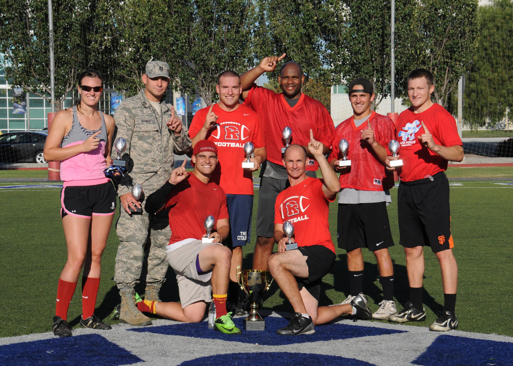 The Space and Missile Systems Center's Remote Sensing Systems directorate's team trounced Aerospace, 41-19, in the Los Angeles Air Force Base, Calif., flag football playoffs for the championship title Aug 14, 2014. (Photos by Joe Juarez) 