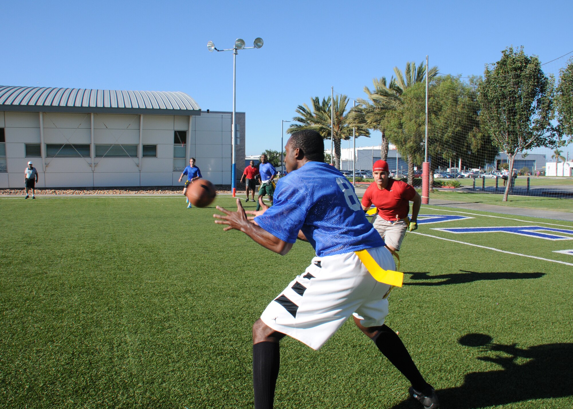The Space and Missile Systems Center's Remote Sensing Systems directorate's team trounced Aerospace, 41-19, in the Los Angeles Air Force Base, Calif., flag football playoffs for the championship title Aug 14, 2014. (Photos by Joe Juarez) 
