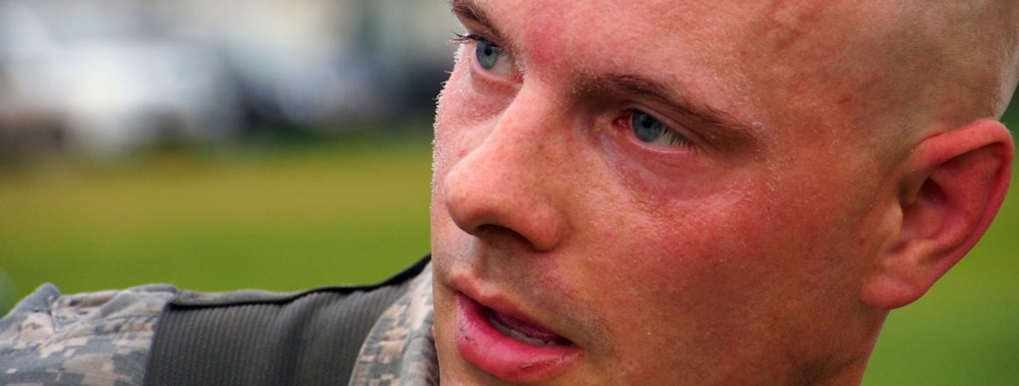 Army Sgt. Jesse Celko, assigned to 3rd Battalion (Airborne), 509th Infantry Regiment, 4th Infantry Brigade Combat Team (Airborne), 25th Infantry Division, U.S. Army Alaska, catches his breath after crossing the finish line of the 12-mile road march portion of the Expert Field Medical Badge course on Joint Base Elmendorf-Richardson, Alaska, Thursday, Aug. 14, 2014. The Expert Field Medical Badge is a U.S. Army decoration dating back to 1965, and is the non-combat equivalent of the Combat Medical Badge. Individuals who successfully complete the EFMB course written and performance tests constitute approximately less than 20 percent of those who begin it. (U.S. Air Force photo/Justin Connaher) 
