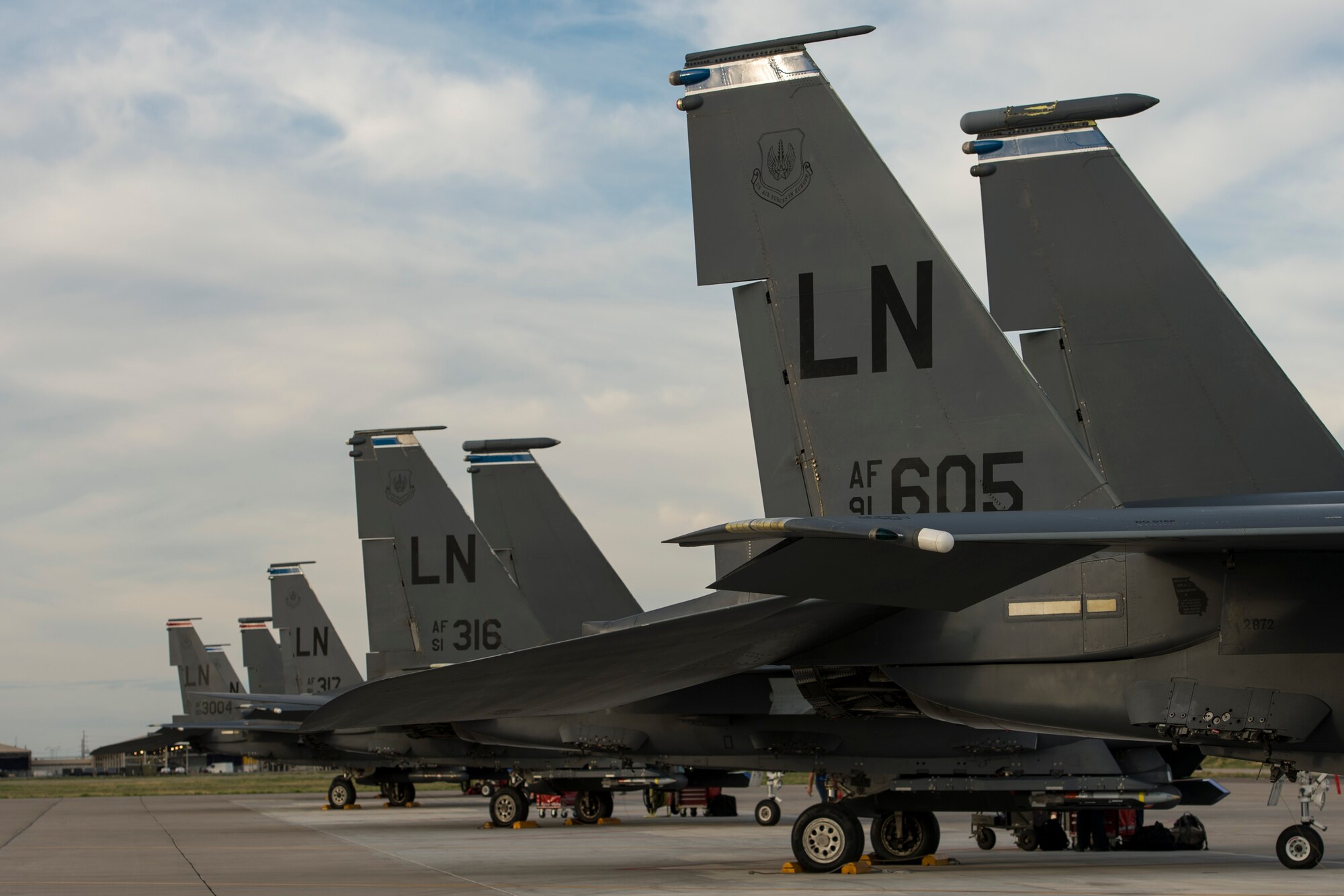 F-15E Strike Eagles assigned to the 494th Fighter Squadron, Royal Air Force Lakenheath, England, prepare for takeoff during an air-to-ground Weapons System Evaluation Program (WSEP) at Hill AFB, Utah, Aug. 13, 2014. WSEP is an annual training exercise where the effectiveness, maintainability, suitability and accuracy of guided munitions is evaluated. The 494th FS, as well as the 510th FS from Aviano Air Base, Italy, joined the 388th Fighter Wing of Hill AFB, Utah. (U.S. Air Force photo by Airman 1st Class Taylor Queen/Released)