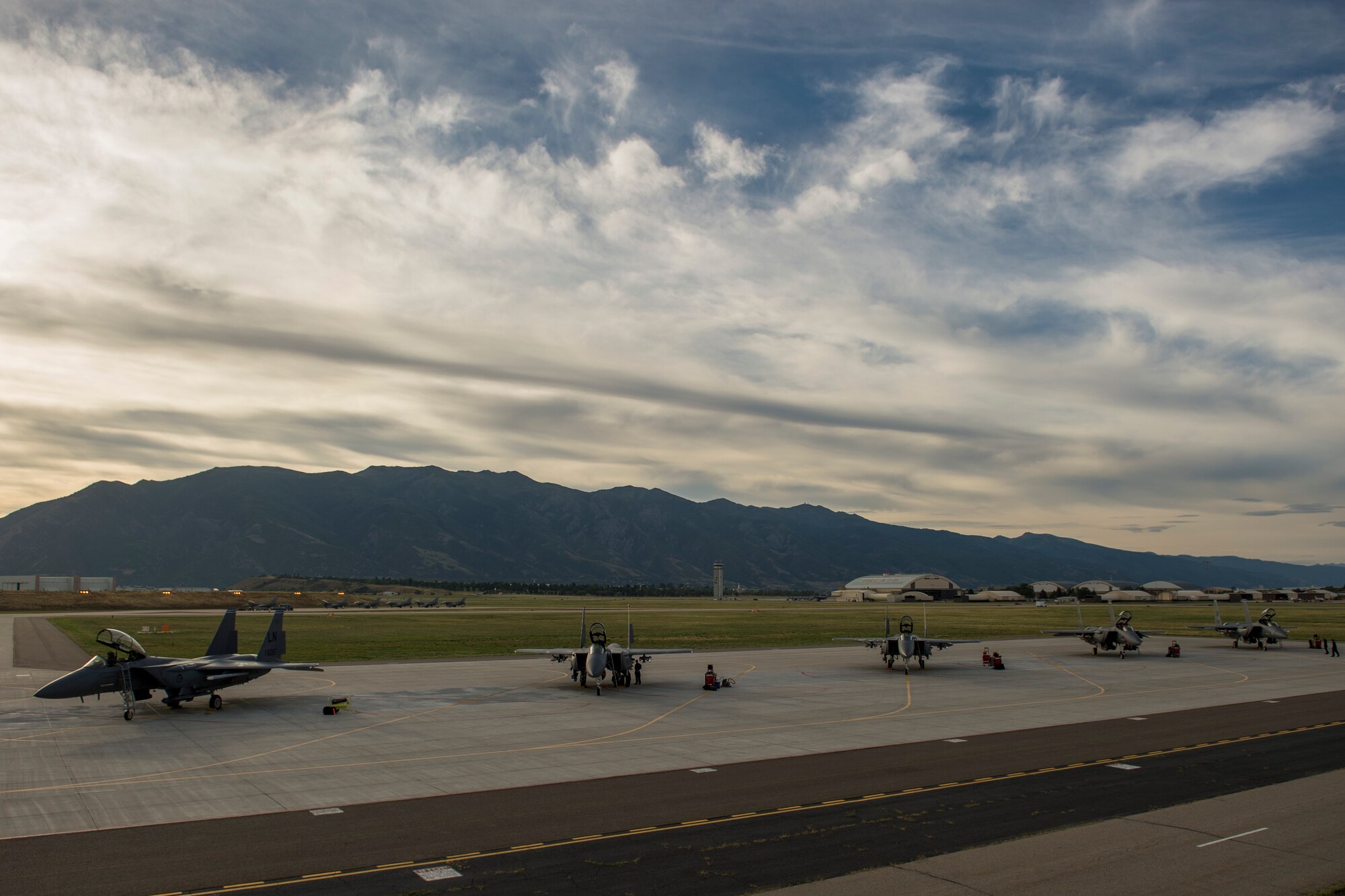 F-15E Strike Eagles assigned to the 494th Fighter Squadron, Royal Air Force Lakenheath, England, prepare for take-off during an air-to-ground Weapons System Evaluation Program (WSEP) at Hill AFB, Utah, Aug. 13, 2014. WSEP is an annual training exercise where the effectiveness, maintainability, suitability and accuracy of guided munitions is evaluated. The 494th FS, as well as the 510th FS from Aviano Air Base, Italy joined the 388th Fighter Wing of Hill AFB, Utah. (U.S. Air Force photo by Airman 1st Class Taylor Queen/Released)
