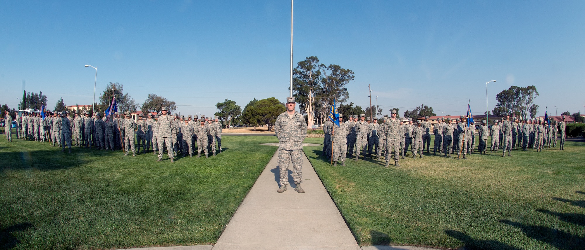 Lt.  Col. Cory Miller, 60th Mission Support Group deputy commander, performs  duties as commander of the troops Aug. 8 during the change of command at Travis Air Force Base.  (U.S. Air Force Photo/T.C. Perkins Jr.)