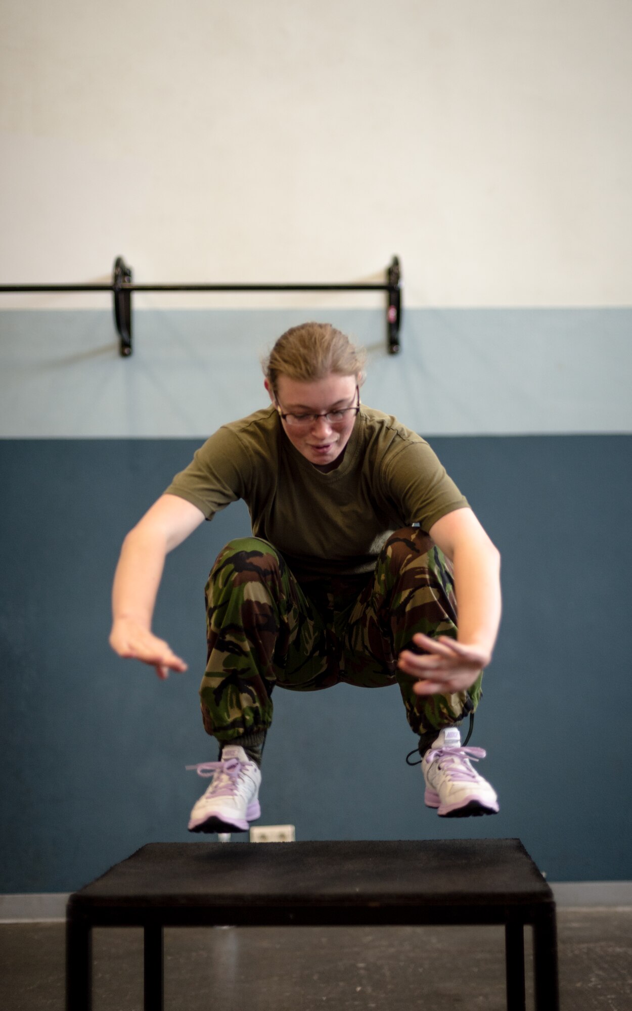 British Air Training Corps Cadet Chloe Nickel, 2375th ATC, participates in a physical training exercise on Vogelweh, Vogelweh Military Complex, Germany, Aug. 14, 2014. The cadets from England, Whales and Northern Ireland took part in the event that immersed them into the life of a U.S. Air Force NCO attending the Kisling NCOA. (U.S. Air Force photo/Airman 1st Class Jordan Castelan)