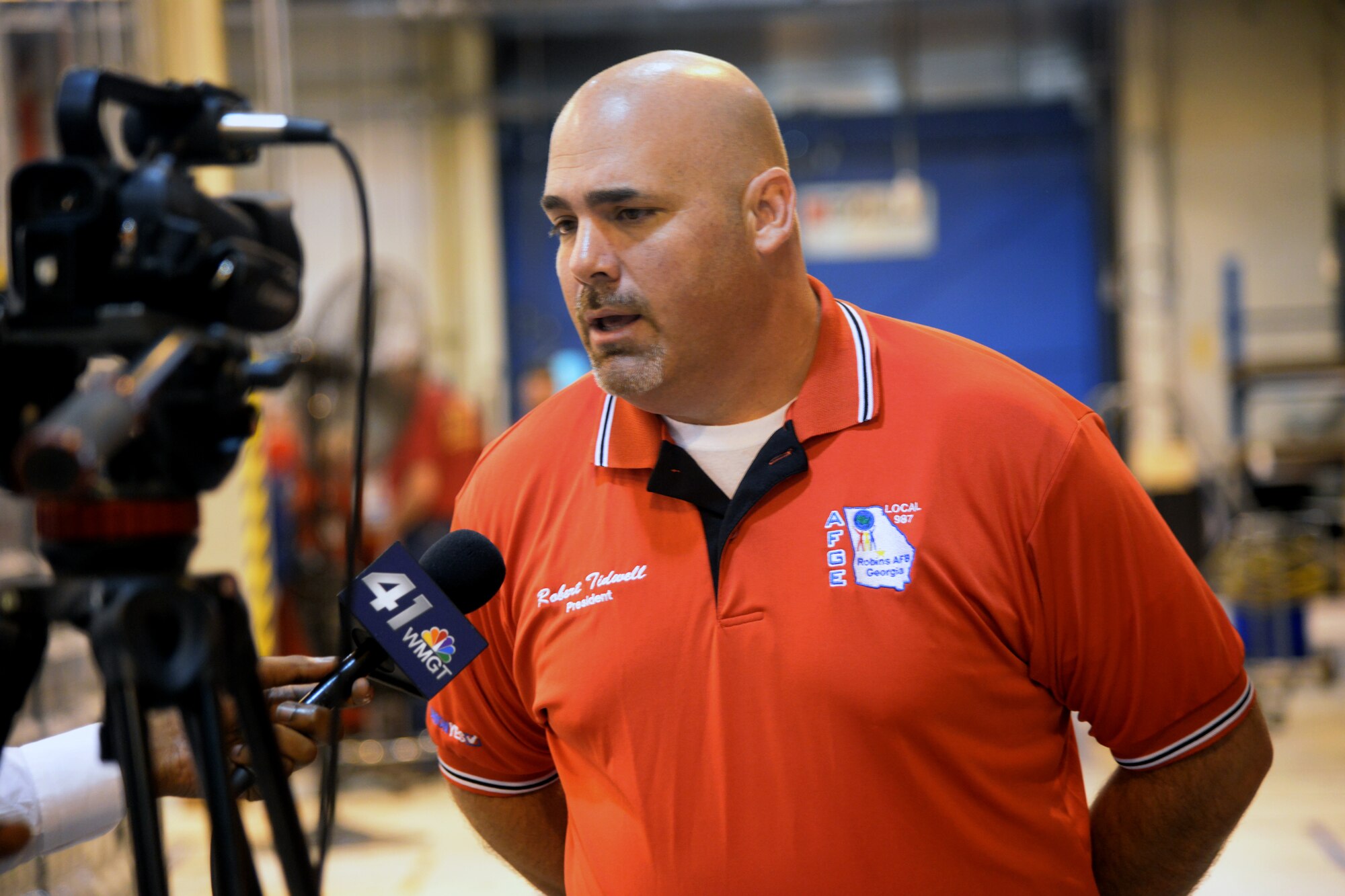 Robert Tidwell, president of AFGE Local 987, speaks with local media at the OSHA alliance signing ceremony, August 8, 2014. (U.S. Air Force photo by Ray Crayton)