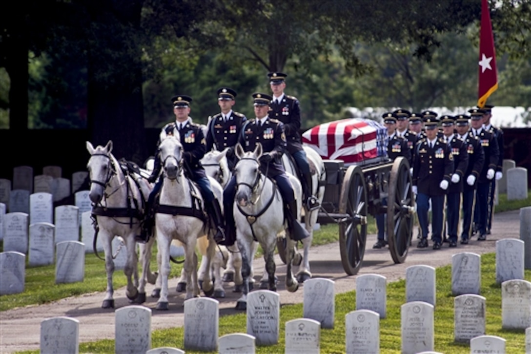 The funeral procession of Army Maj. Gen. Harold J. Greene enters Arlington National Cemetery during a military funeral in Arlington, Va., Aug. 14, 2014. Greene was the highest-ranking service member killed during the wars in Iraq and Afghanistan. 