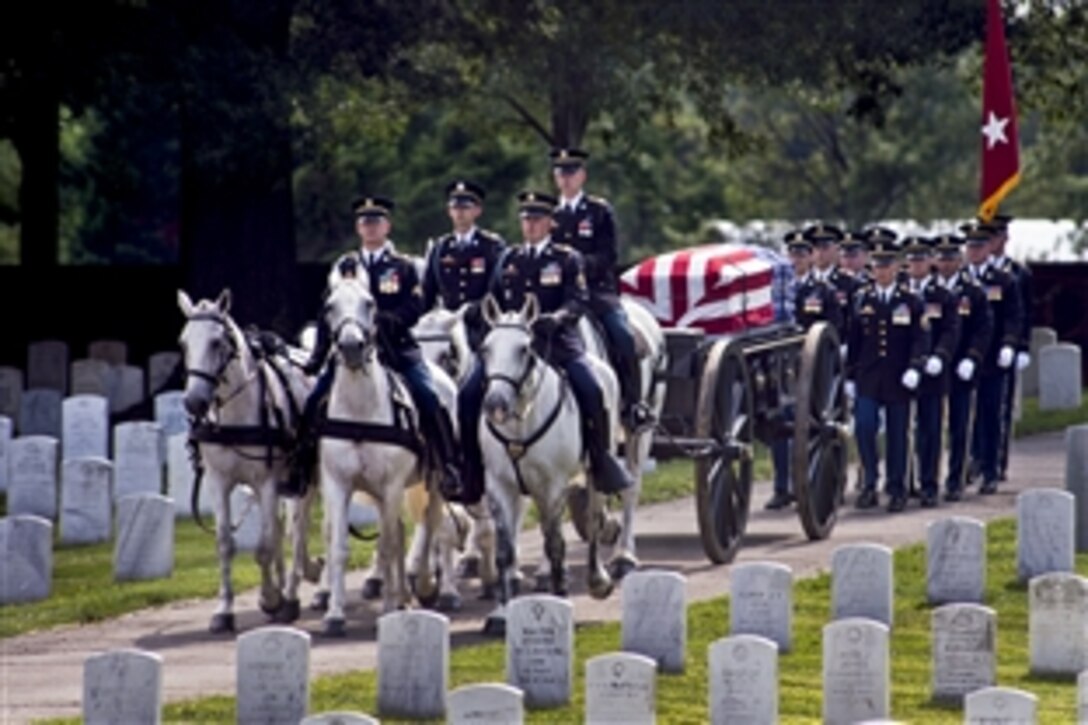 The funeral procession of Army Maj. Gen. Harold J. Greene enters Arlington National Cemetery during a military funeral in Arlington, Va., Aug. 14, 2014. Greene was the highest-ranking service member killed during the wars in Iraq and Afghanistan. 