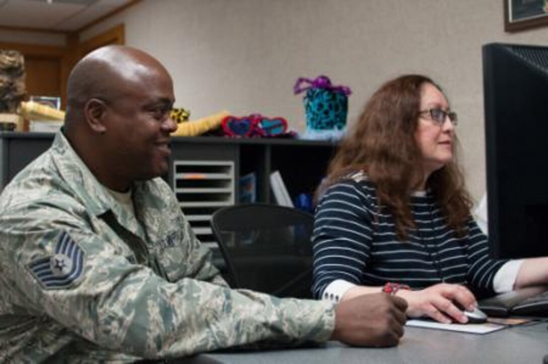 Air Force Tech. Sgt. William Bowen, 164th LRS, evaluates supply functions with Telissa Brown, 673rd LRS on Joint Base Elmendorf-Richardson (JBER), Alaska, July 16, 2014. Bowen was receiving training during his two week annual training on JBER. (U.S. Air National Guard photo by Staff Sgt Allan Eason/Released)















