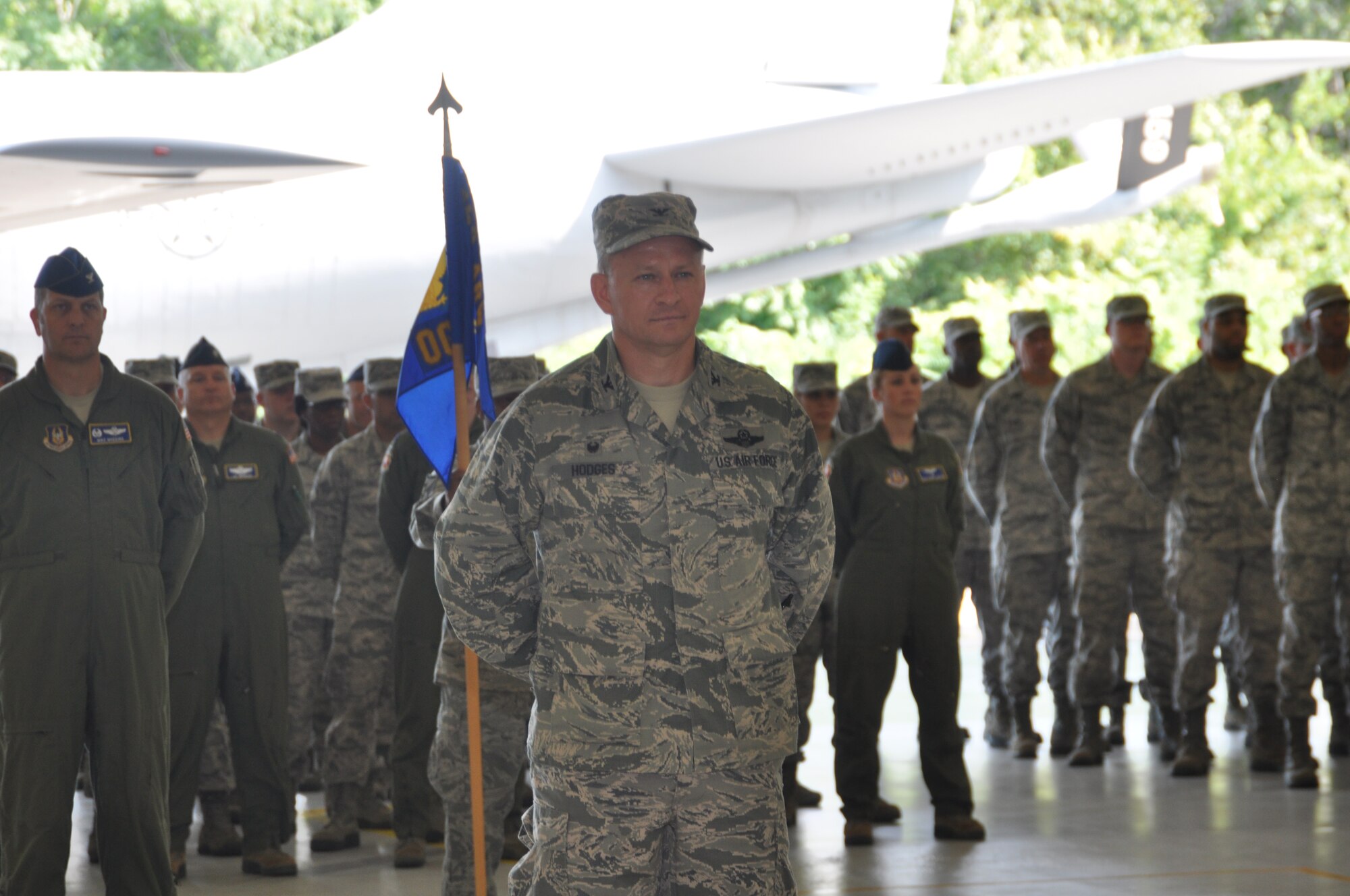 Col. Scheid P. Hodges, 459th Air Refueling Wing vice commander, stands in front of The 459th Operations Group, 459th Maintenance Squadron and 459th Mission Support Group at the wing change of command ceremony held in Hangar 10, August 16, 2014. Hodges received accolades from Brigadier Gen. John C. Flournoy, 4th Air Force commander and presiding officer, Col. Thomas K. "TK" Smith, Jr., 459 ARW commander and Col. William H. Mason, former 459 ARW commander for assuming the responsibility of commander in the interim of Mason’s departure and Smith’s arrival . (U.S. Air Force photo/ Staff Sgt. Amber J. Russell)
  

