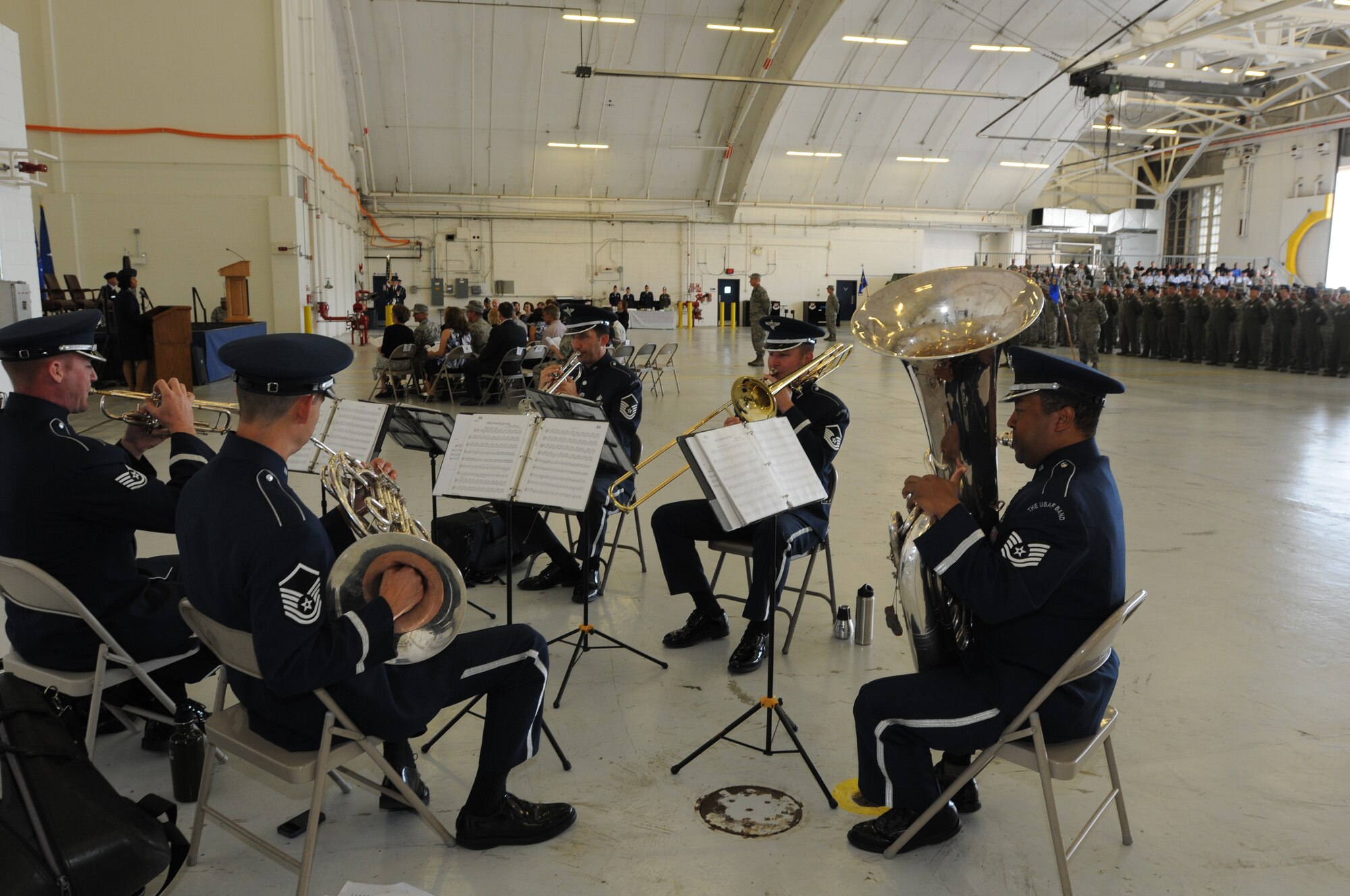 The United States Air Force Band Brass Quintet played several songs before, during and after the 459th Air Refueling Wing change of command ceremony held in Hangar 10, August 16, 2014. (U.S. Air Force photo/ Staff Sgt. Amber J. Russell)