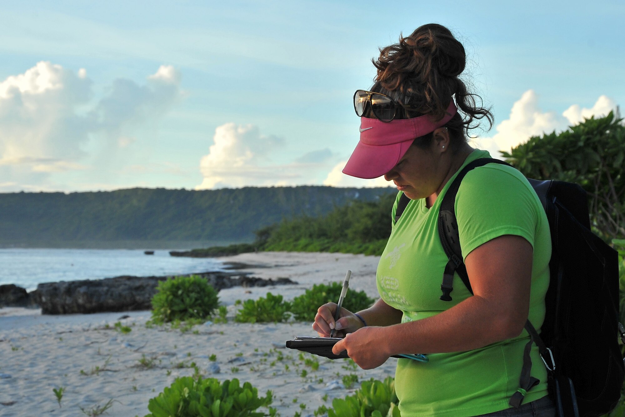 Marylou Staman begins a survey of beaches in the Tarague Basin Aug. 13, 2014, on Andersen Air Force Base, Guam. Staman and a scientific research team have monitored 14 nests in the basin since they started the surveys in March 2014 and have recorded a total of 984 hatchlings thus far. Staman is a University of Guam Sea Turtle Monitoring, Protection and Educational Outreach on Guam project manager. (U.S. Air Force photo/Staff Sgt. Melissa B. White)