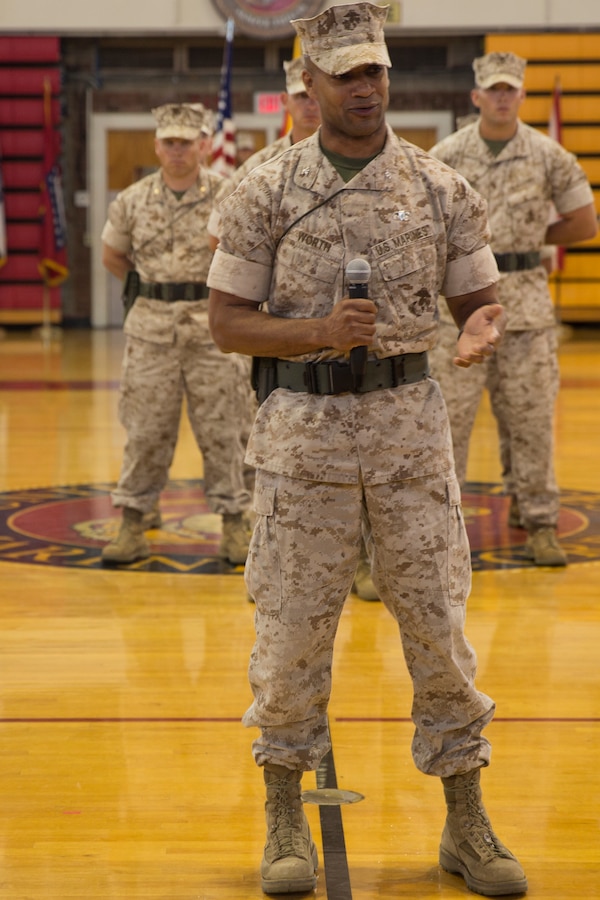 Col. Calvert L. Worth Jr., the incoming commanding officer of 6th Marine Regiment, 2nd Marine Division addresses the Marines under his command during a change of command ceremony at Camp Lejeune, N.C., July 10, 2014. Worth expressed his determination to work with and for the Marines now under his charge. (U.S. Marine Corps photo by Lance Cpl. Kaitlyn Klein)


