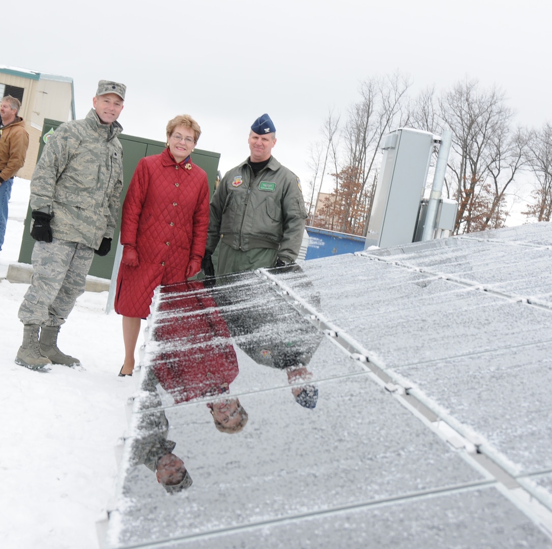 From left, Lt. Col. William Giezie, the 180th Fighter Wing Civil Engineering Squadron commander, Rep. Marcy Kaptur, and Col. Mark Bartman, 180th Fighter Wing commander, view the solar field at the 180th Fighter Wing Air National Guard Base during a press conference announcing an expansion of the highly successful alternative energy solar field Jan. 5, 2009. The field is scheduled for completion in October 2010 and is part of the 180th FWs Renewable Energy Project funded by the Department of Defense Research and Development Program.